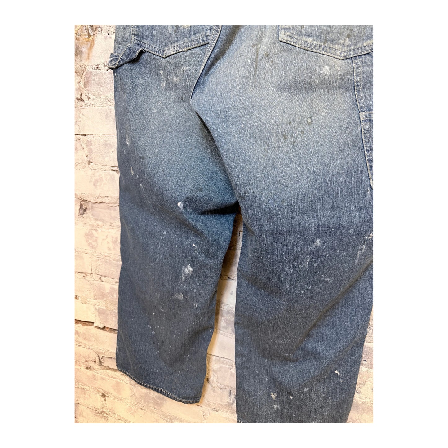 Men's customized side open Panther denim pants by H-Unit, featuring stylish design and unique side openings.