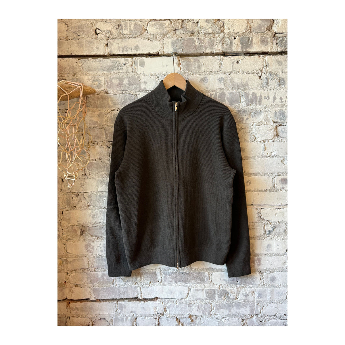 Men's NN07 Danny full zip sweater in dark army color, showing the knit fabric and front zipper closure.