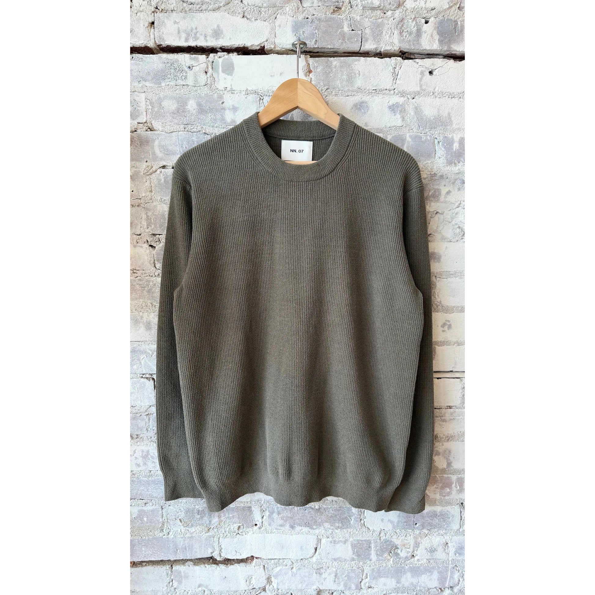 Men's Danny Sweater by NN07, beige capers color, close-up of soft knit fabric and ribbed collar detail.