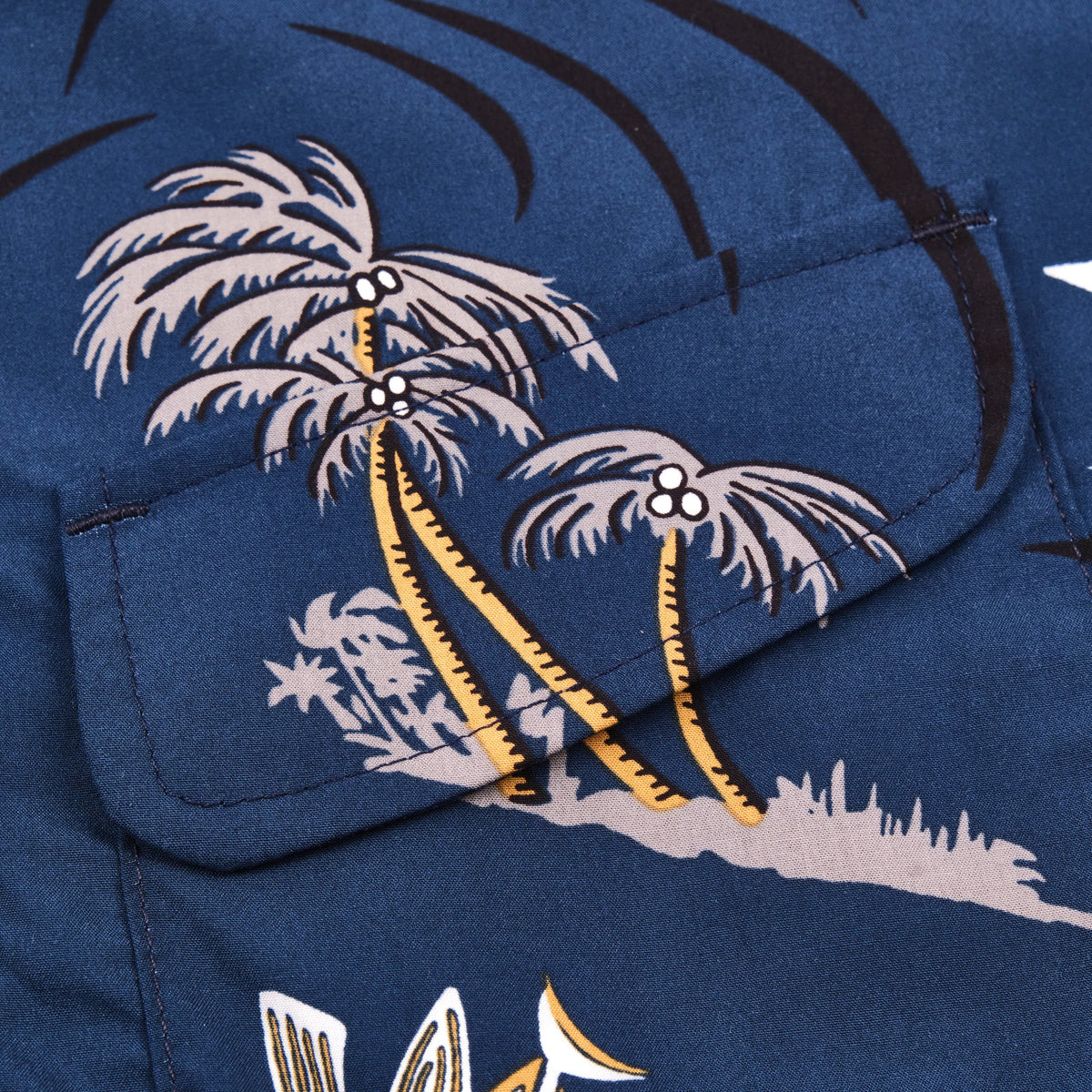Men's navy flying fish Dean Double Pocket short sleeve shirt by Freenote Cloth, featuring a relaxed fit and double chest pockets.