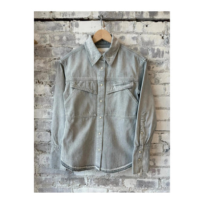 Light grey women's denim shirt by Closed, featuring classic button-down style and casual fit, shown on a model.