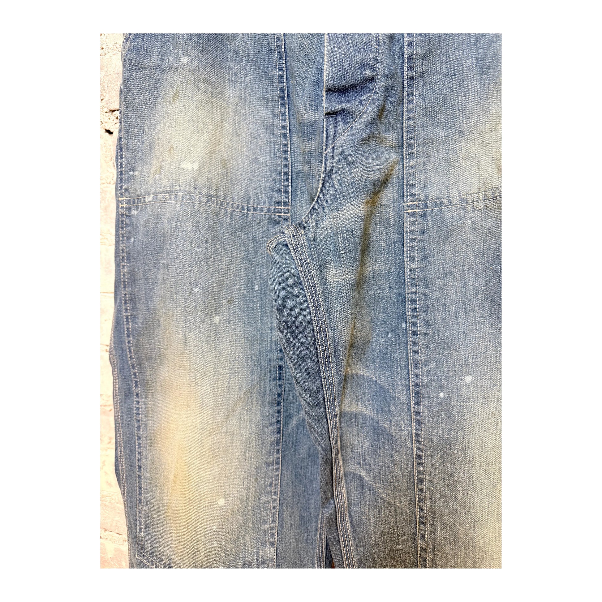 Men's H-Unit denim painter pants with side open design in used wash, featuring practical pockets and relaxed fit.