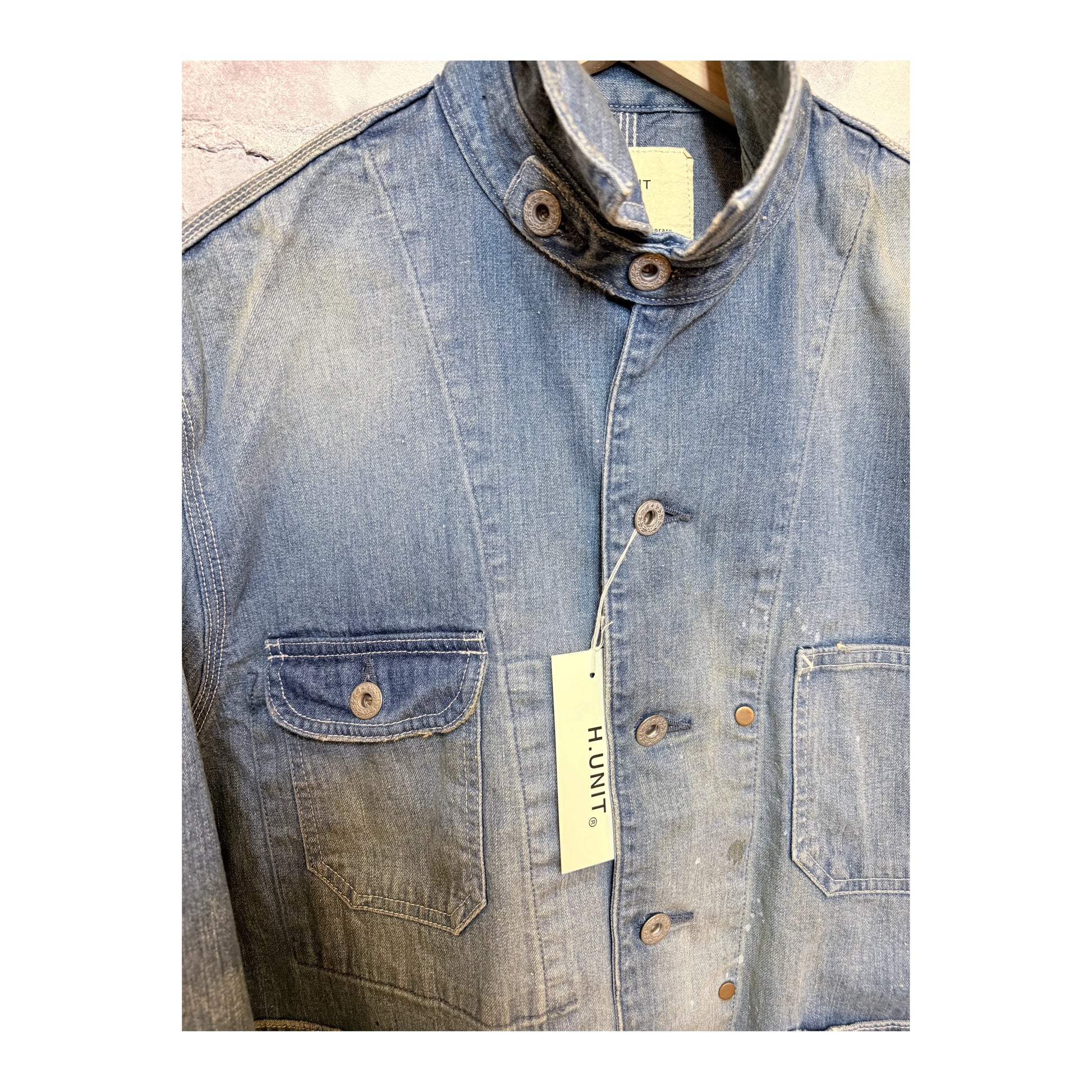 Men's used-wash denim coveralls in indigo by H-Unit, featuring a rugged, casual fit and multiple front pockets.