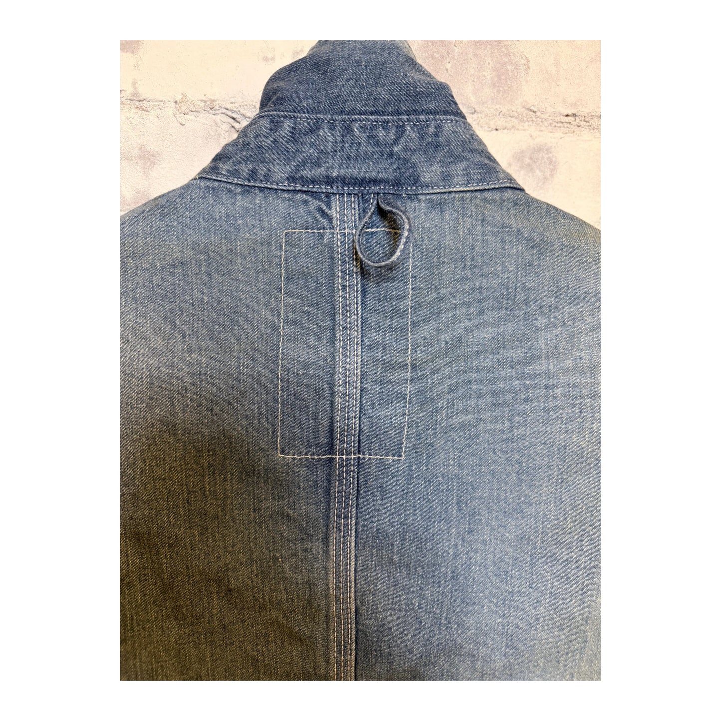 Men's used-wash denim coveralls in indigo by H-Unit, featuring a rugged workwear style with multiple pockets and a classic fit.