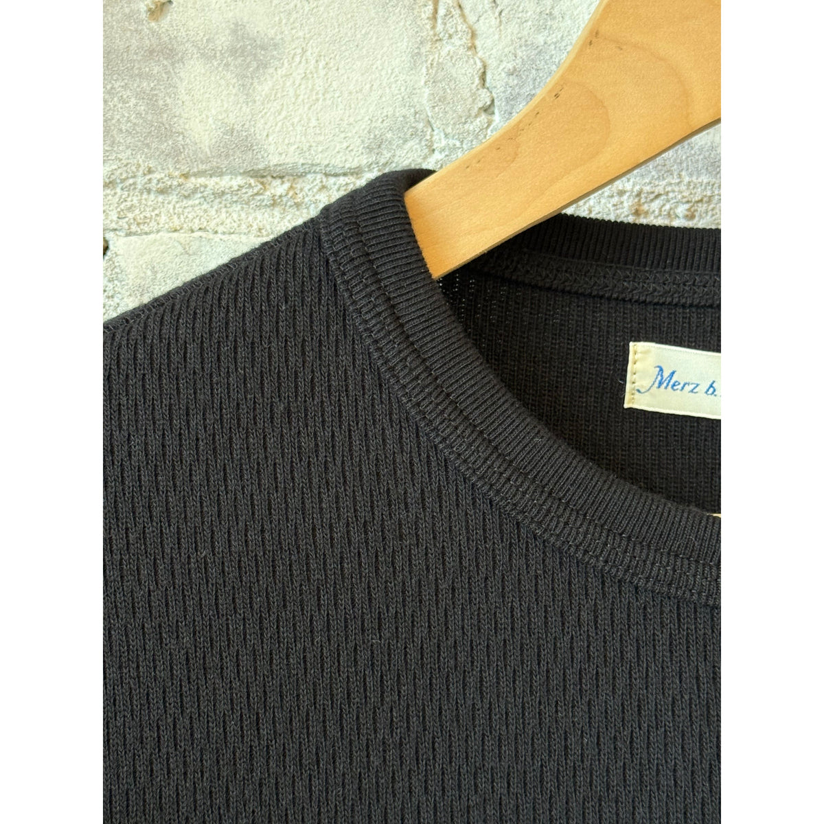 Women's deep black cotton thermal longsleeve with diamond pattern by Merz b. Schwanen, featuring a cozy, textured design.