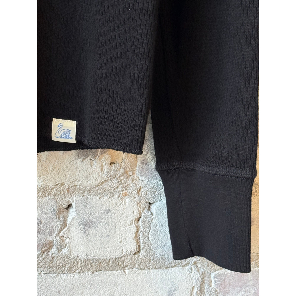 Women's diamond-patterned cotton thermal longsleeve by Merz b. Schwanen in deep black, showcasing the textured diamond design.