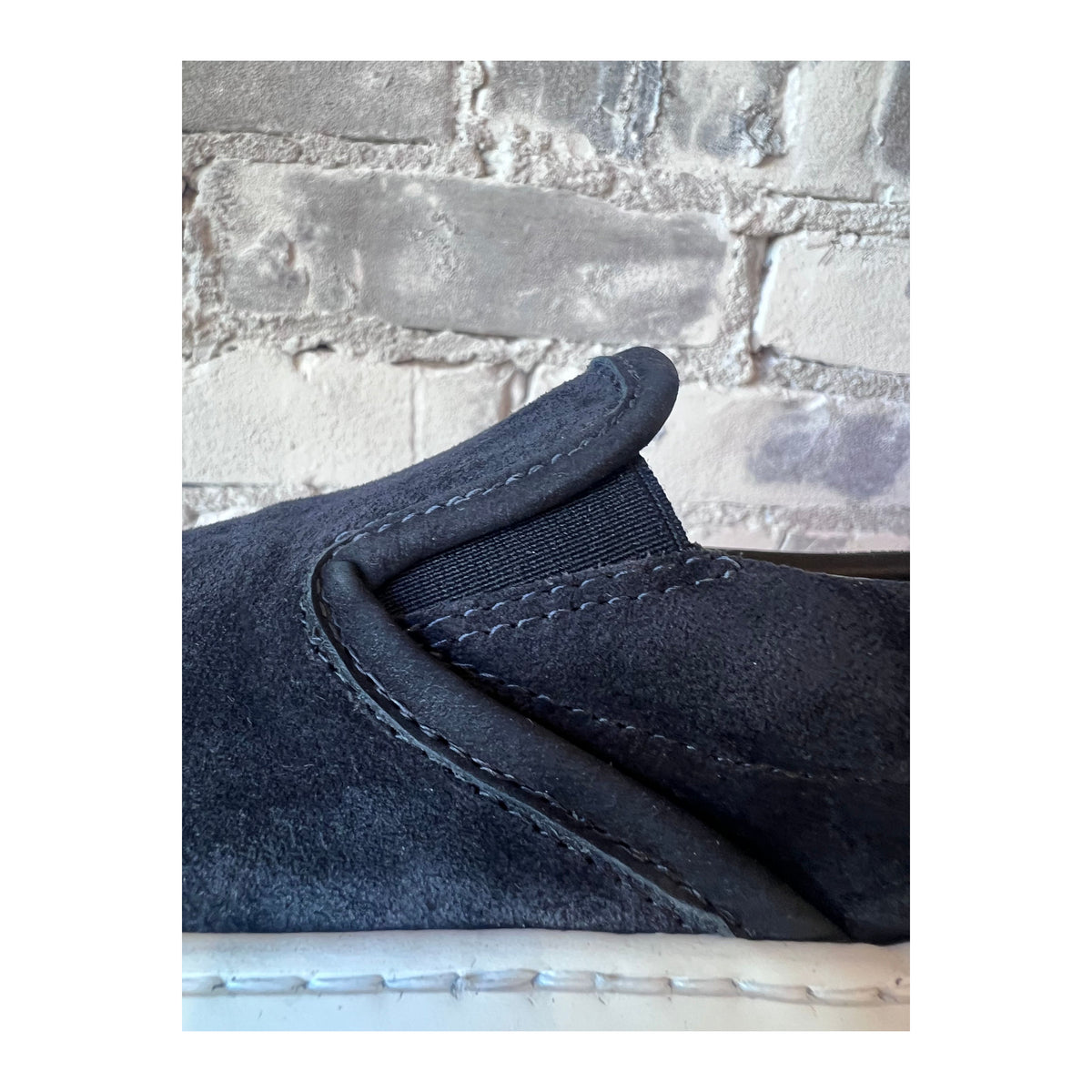 Men's navy Garda Suede Low Slip-On shoes by Diemme, showcasing the stylish slip-on design and smooth suede texture.