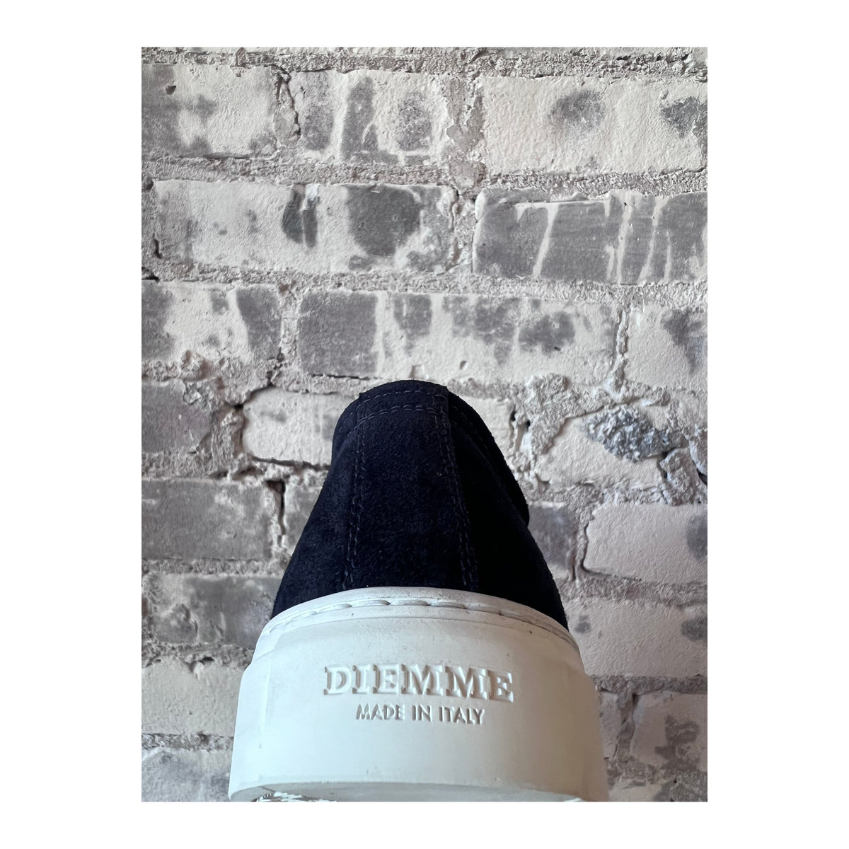 Men's navy Loria Suede Low Sneaker by Diemme, showcasing a stylish low-top design with suede material and casual athletic style.