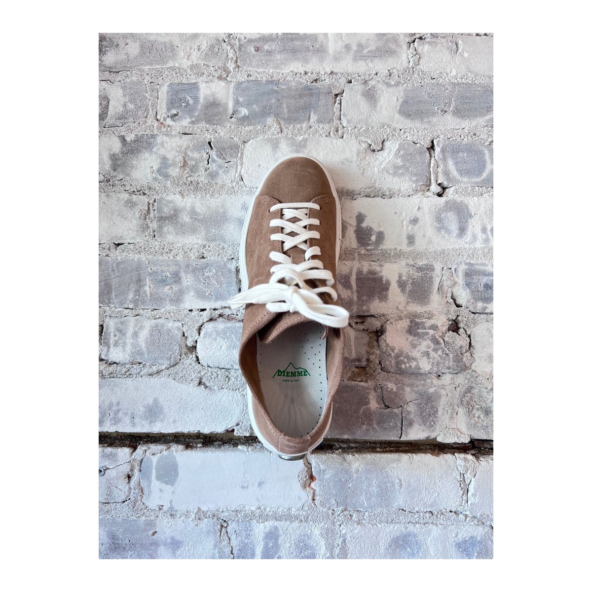 Men's Diemme Loria suede low sneaker in taupe, featuring a sleek design and comfortable low-top silhouette.