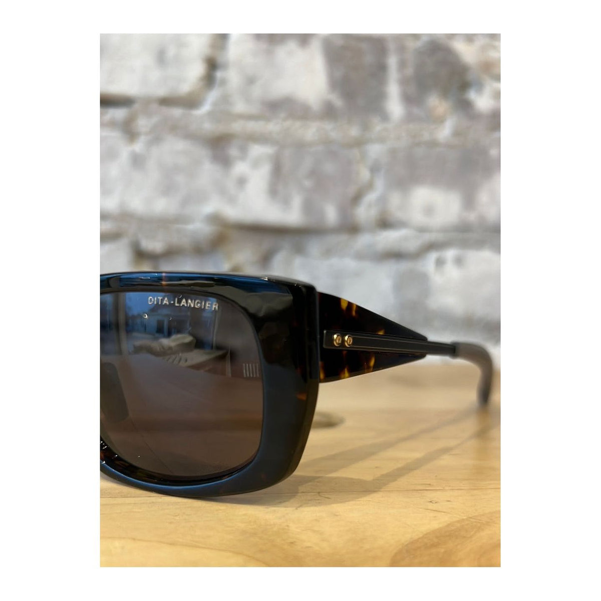 DITA LSA 703 tortoise and black gunmetal accessories with G12 detail, featuring sleek, modern design and high-quality craftsmanship.