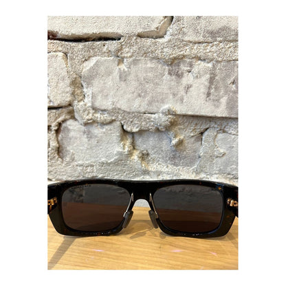 DITA LSA 703 tortoise and black gunmetal accessories with G12 detailing, showcasing elegant eyewear accents.