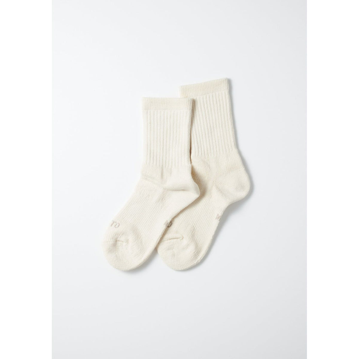 Men's double face organic cotton mini crew socks by Rototo in ivory, showing the soft, breathable fabric and classic design.