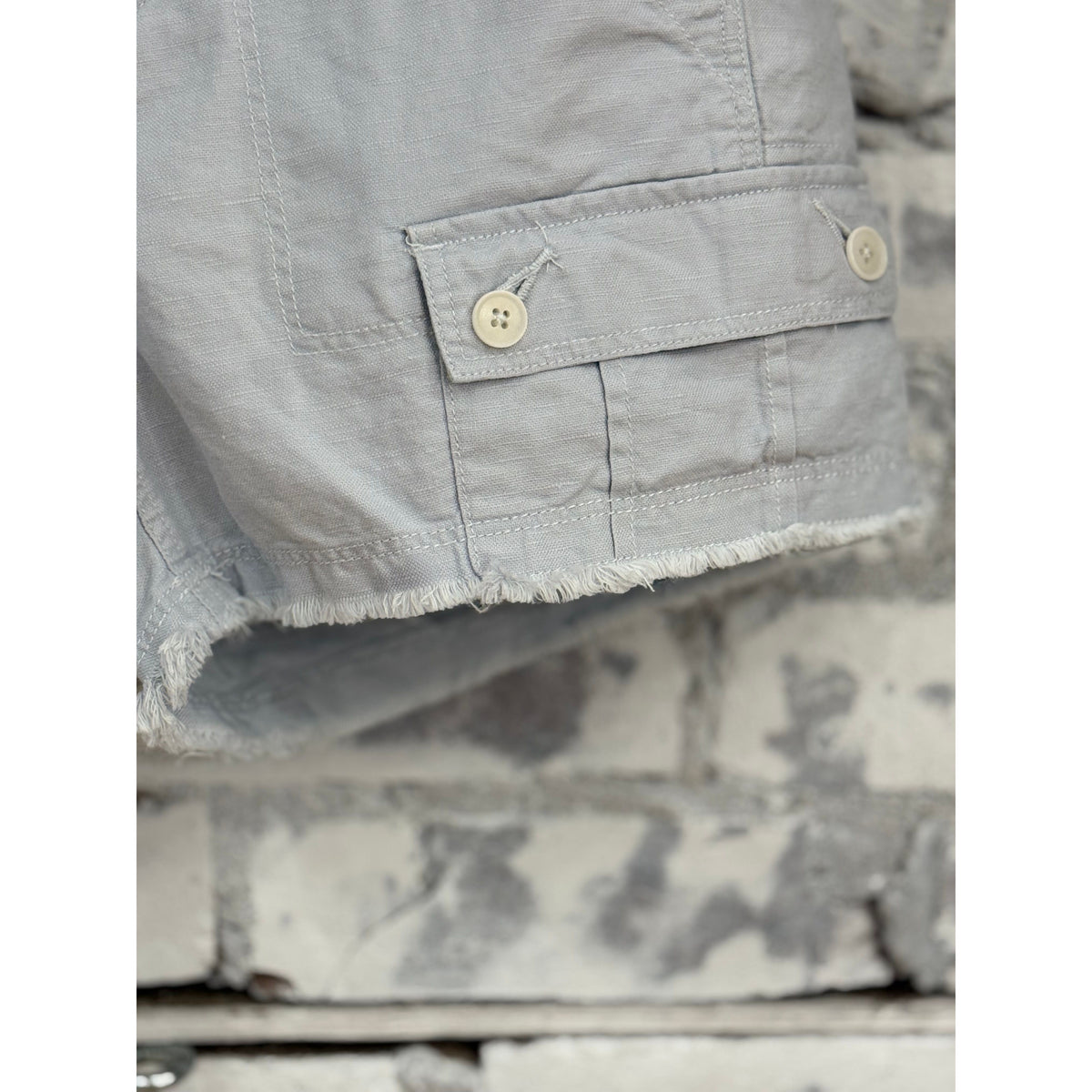 Light blue women's drill shorts by G1 Women's, showing a comfortable fit and casual style on a model.
