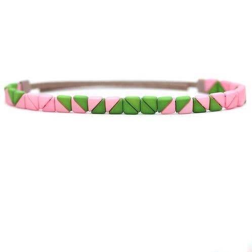 Watermelon wedge bracelet by Julie Rofman, vibrant jewelry accessory featuring colorful watermelon slice design.