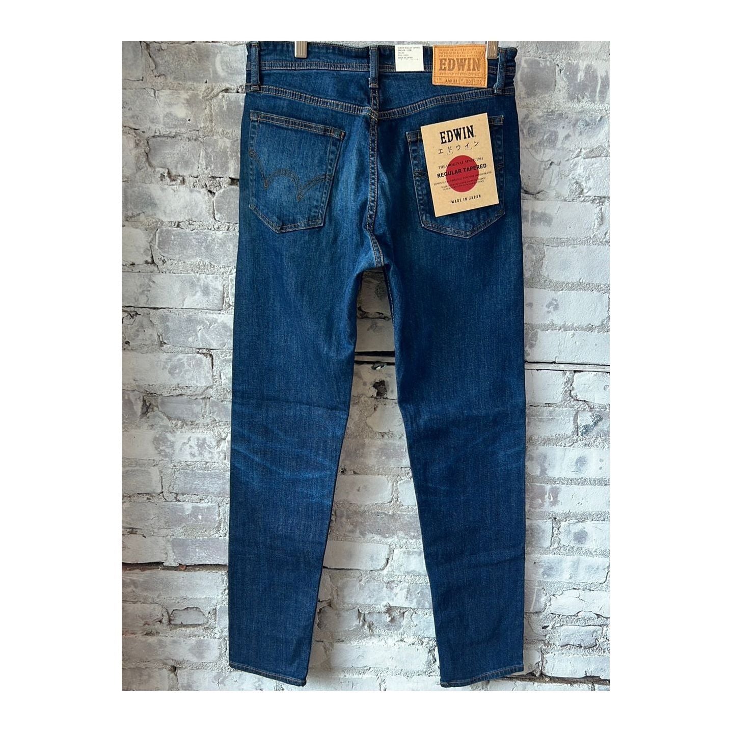 Men's Edwin Aomori Regular Tapered Denim jeans in dark indigo with a classic fit and subtle fading, displayed on a plain background.