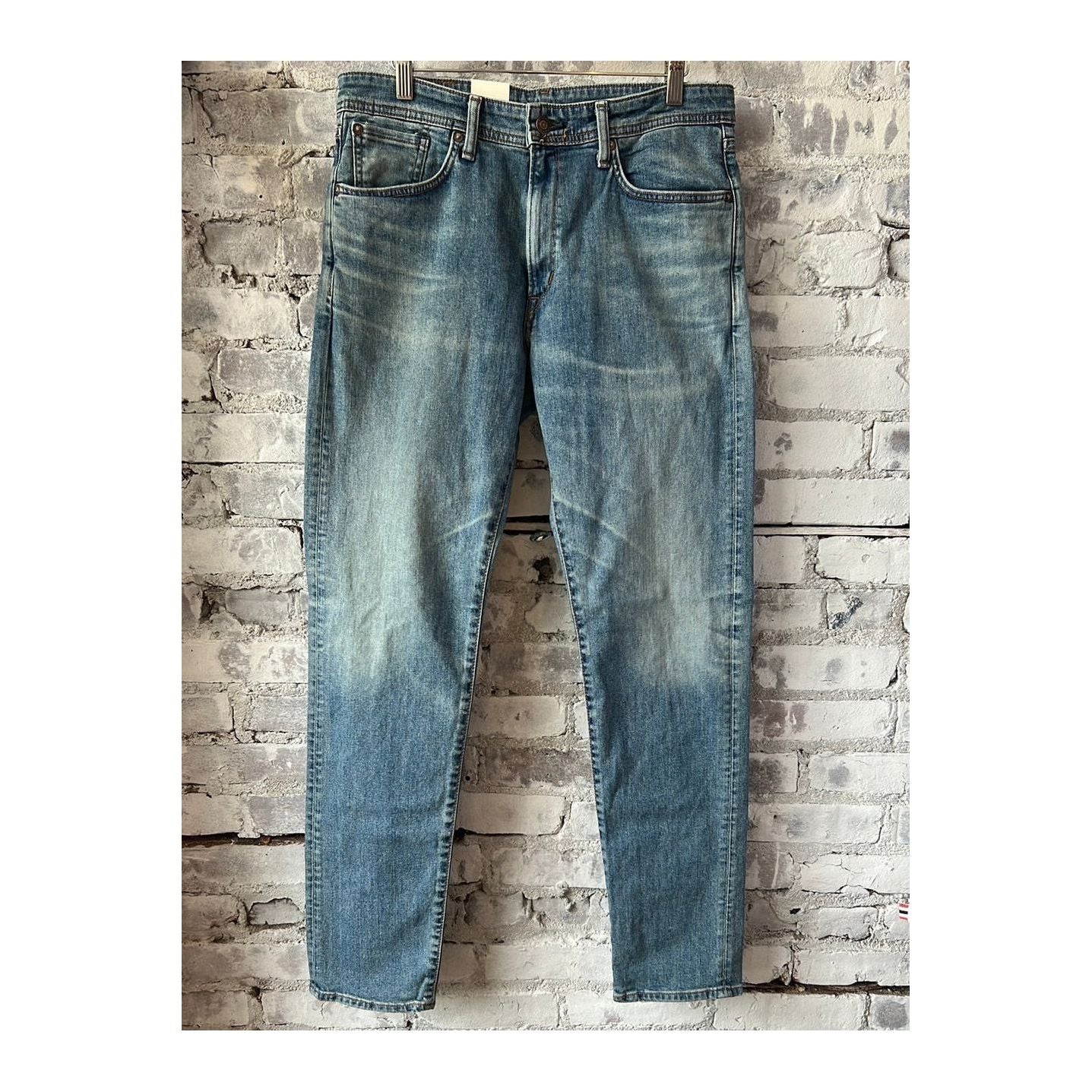 Men's Edwin Aomori Regular Tapered Denim jeans, showing the dark indigo fabric with subtle fading and classic five-pocket design.