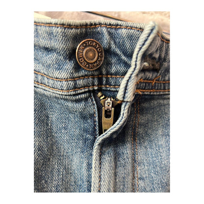 Men's Edwin Aomori Regular Tapered Denim jeans, shown in a natural pose showcasing the fit and dark indigo color.
