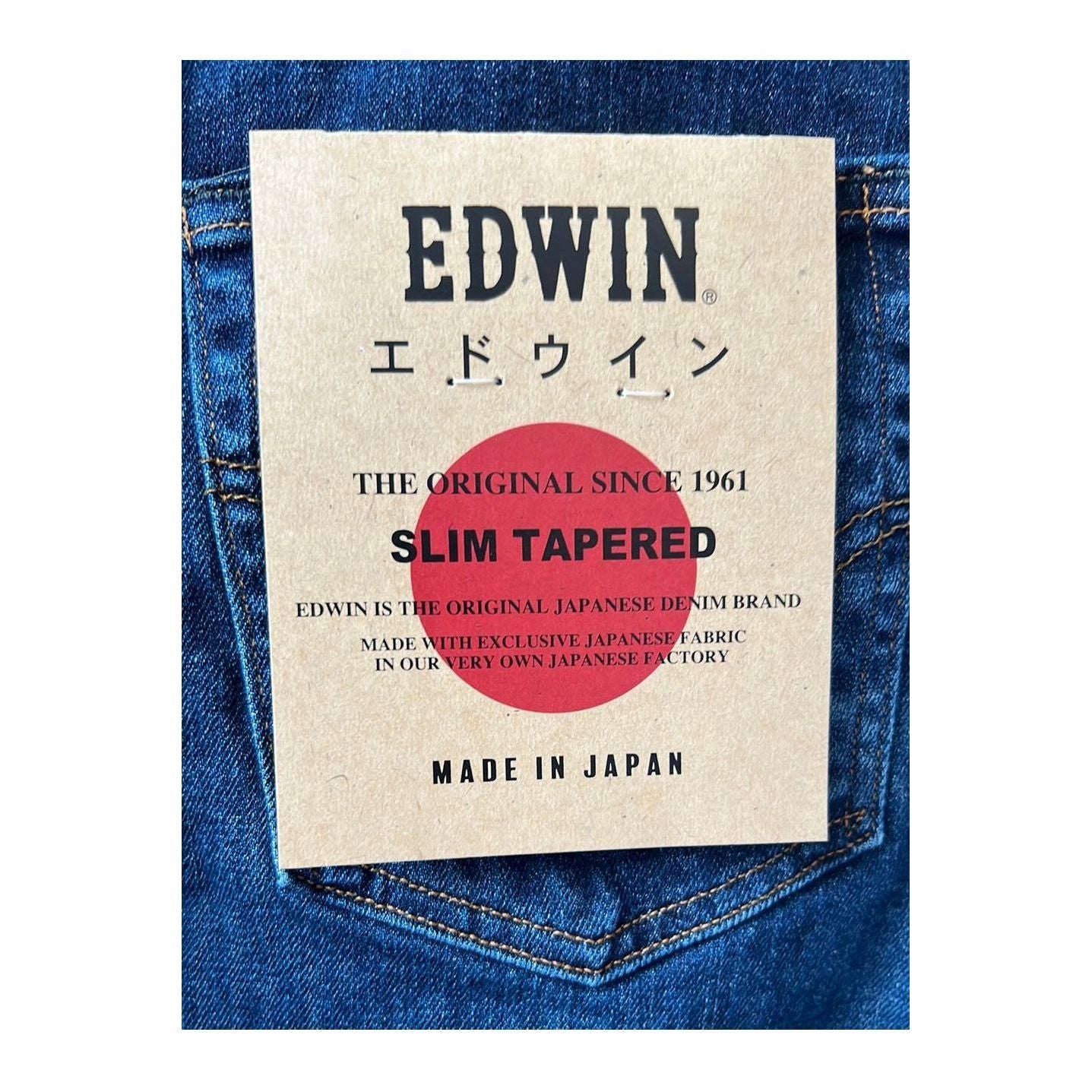Men's Edwin Aomori Slim Taper Denim jeans in dark wash, featuring a modern tapered fit and classic denim texture.