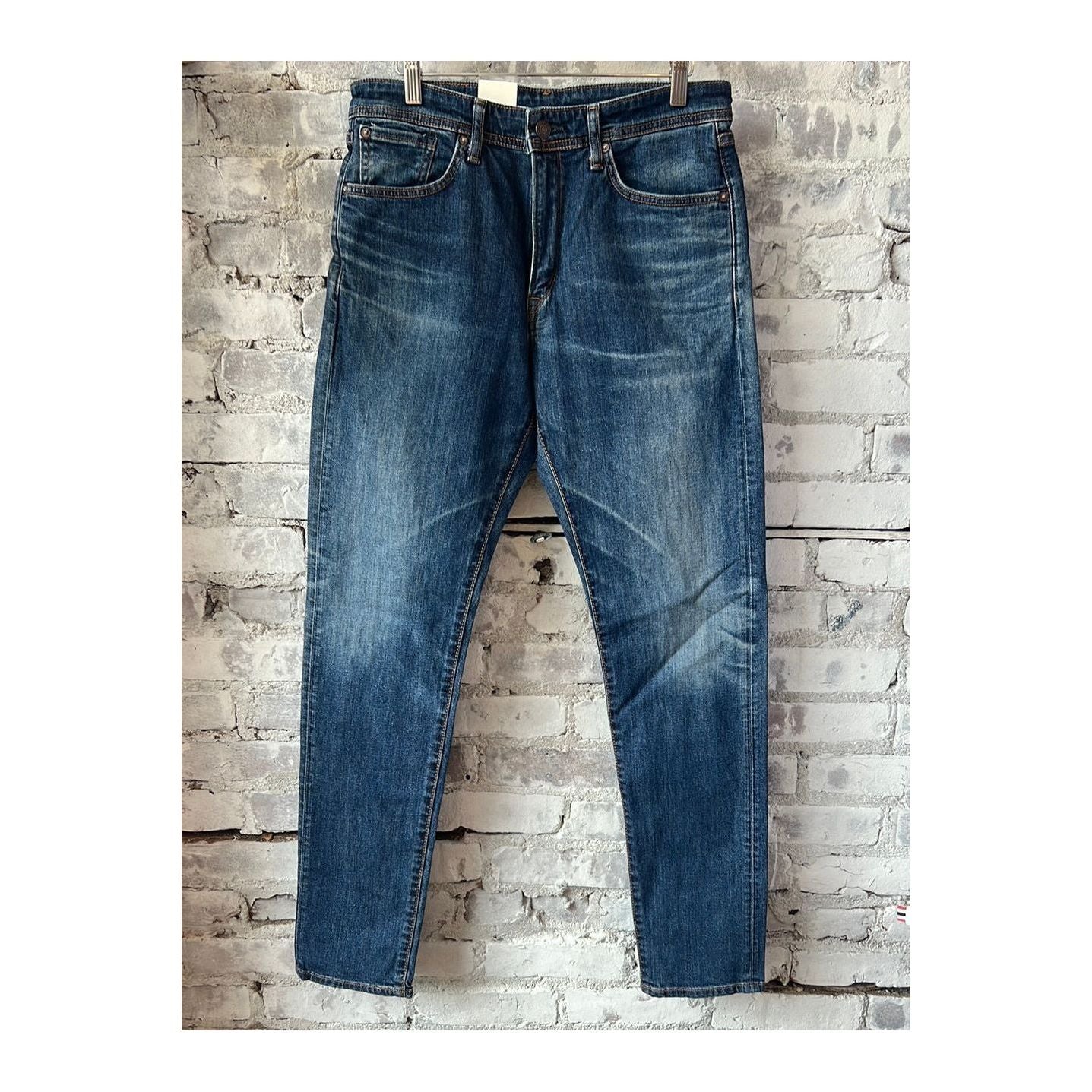 Men's Edwin Aomori Slim Taper Denim jeans, dark blue denim with a fitted style and classic stitching detail.