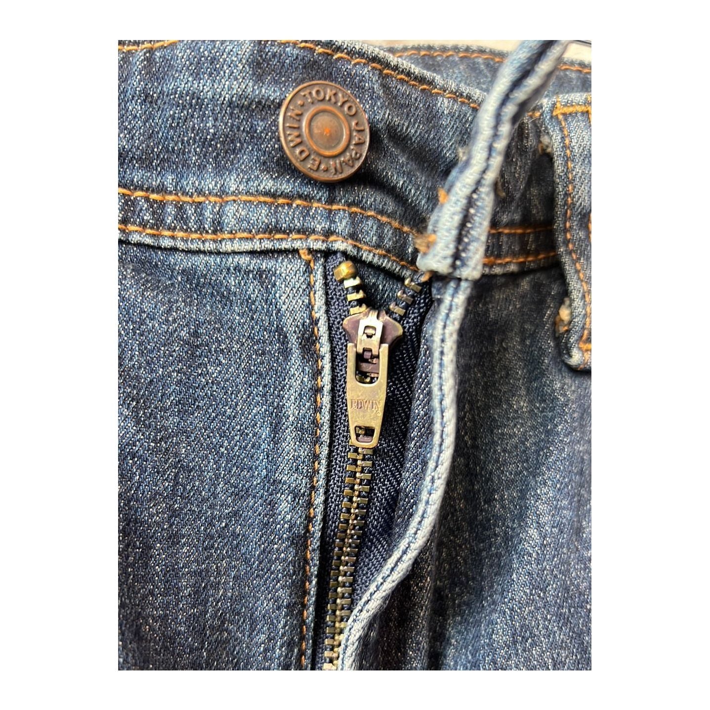 Men's Edwin Aomori Slim Taper Denim jeans, dark indigo color with subtle fading and classic five-pocket design.