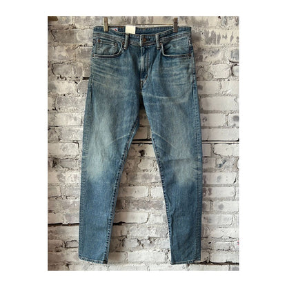 Men's Edwin Aomori Slim Taper Denim jeans in Raito color, showcasing the fitted style with classic denim fabric and detailing.