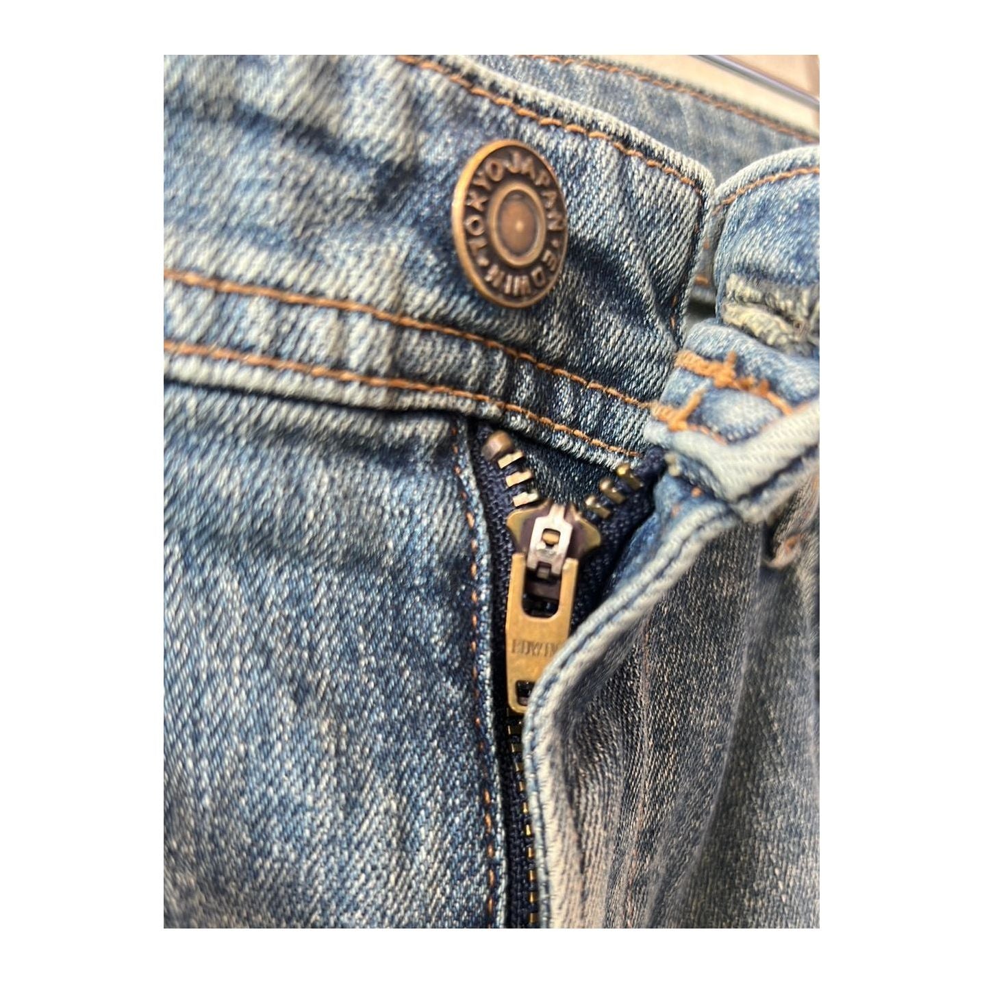 Men's Edwin Aomori Slim Taper Denim jeans in Raito color, showing the fitted style and classic denim fabric.