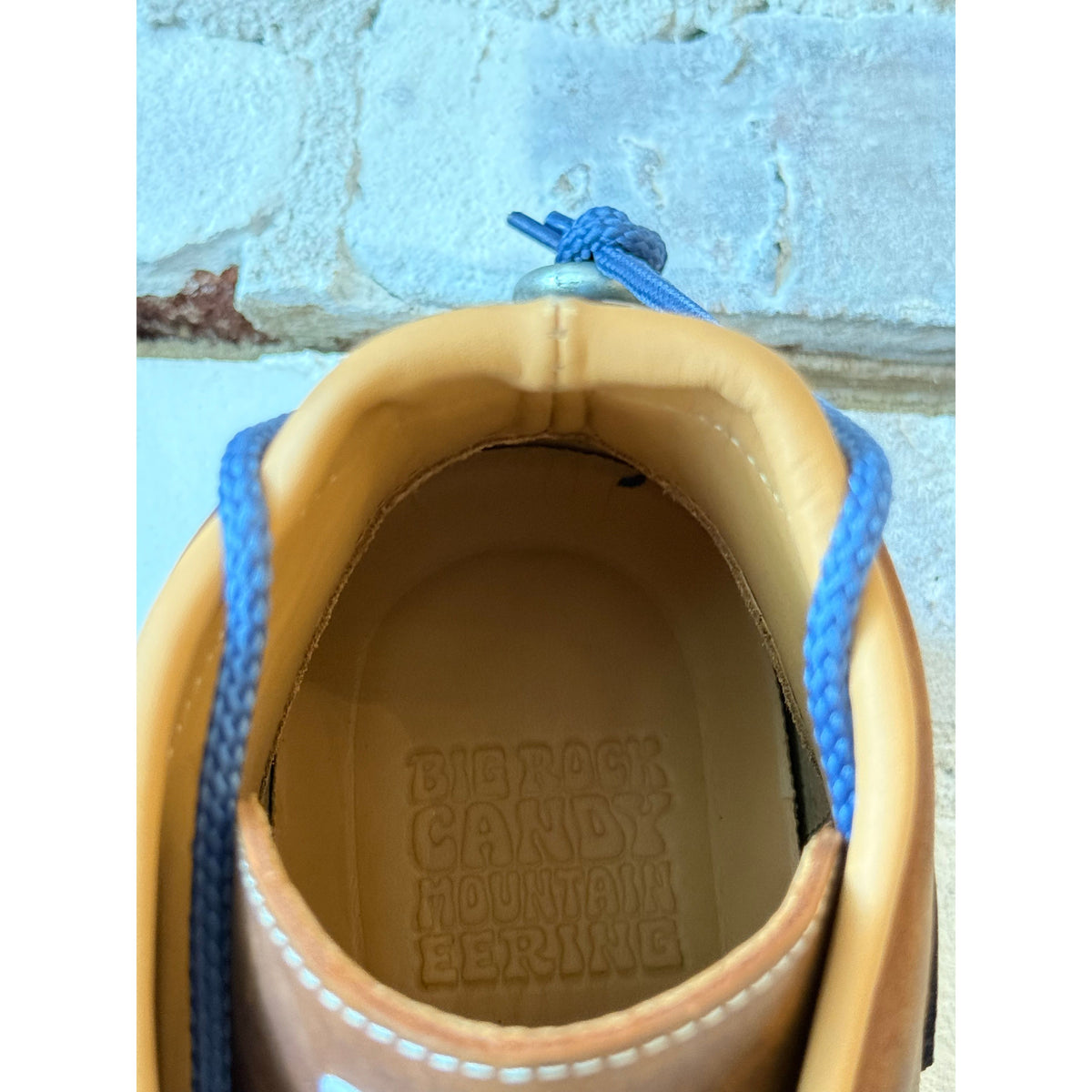 Men's El Cap Leather Boot in Nutmeg by Big Rock Candy Mountaineering, showing the sturdy brown leather upper and rugged sole.