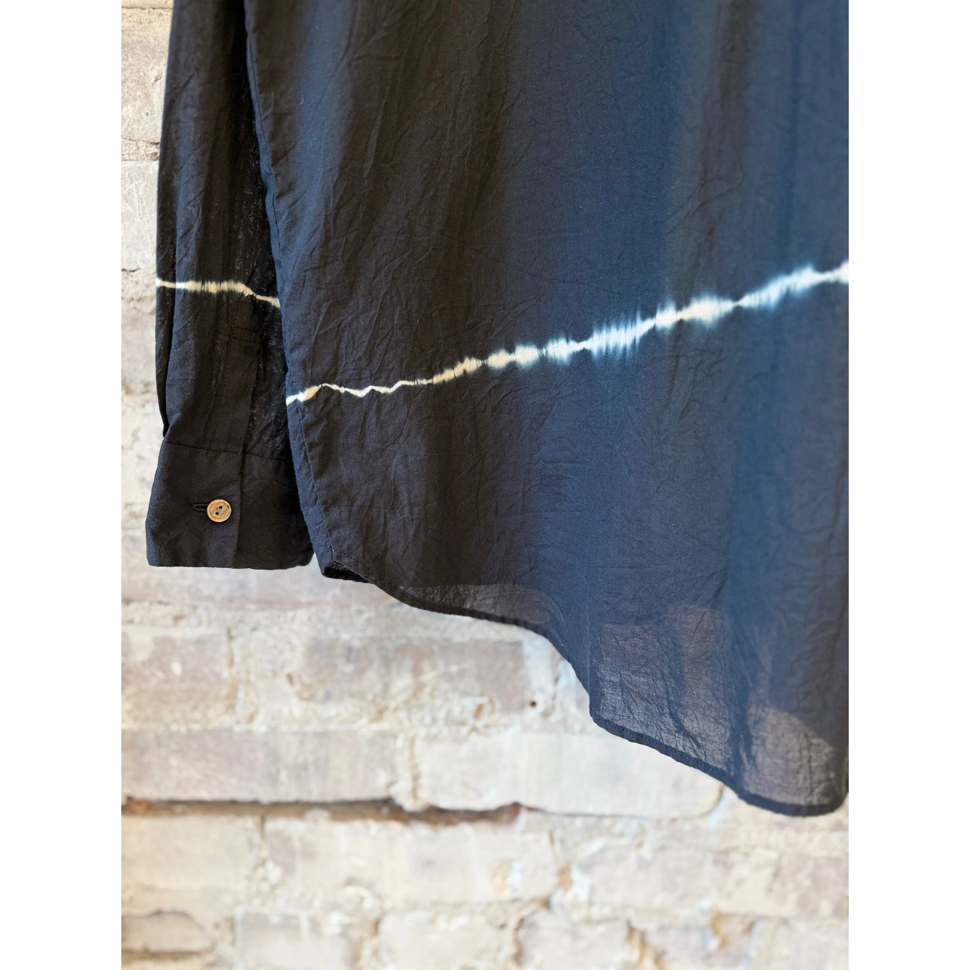Women's engineered tie-dye striped shirt in dark navy by Pas De Calais, featuring a relaxed fit and bold pattern.