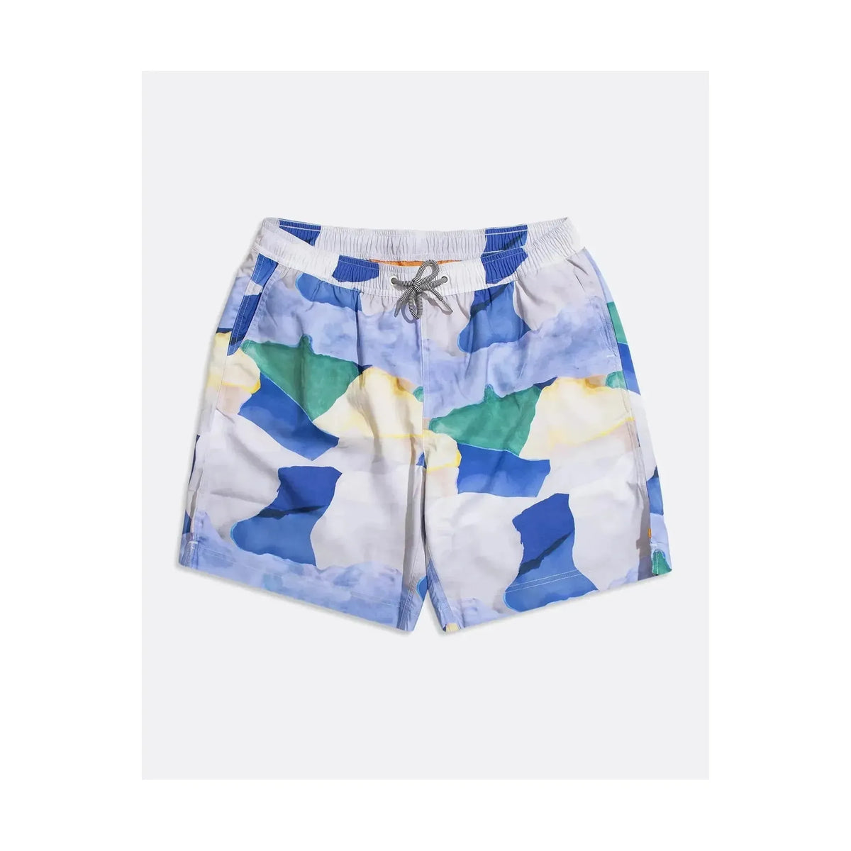Men's printed swim shorts by Far Afield featuring a landscape design, shown in a close-up view of the colorful fabric.