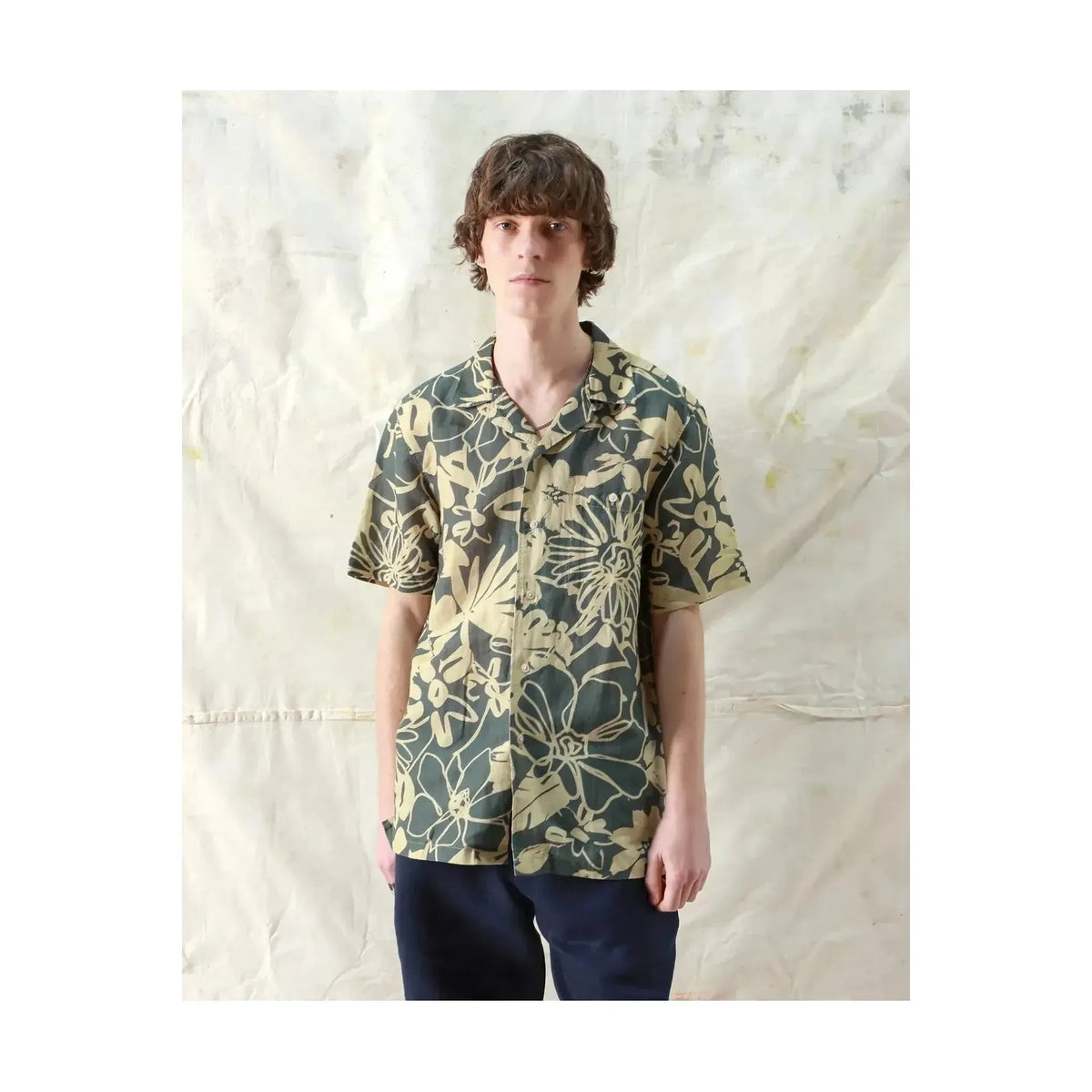 Men's Selleck shirt by Far Afield in charcoal grey with foliage print, featuring a casual fit and button-down design.