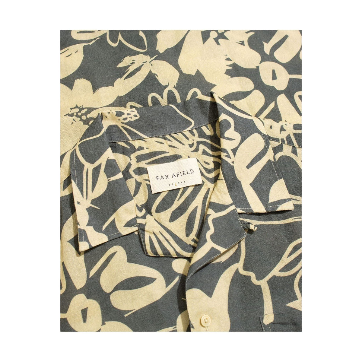 Men's Selleck shirt by Far Afield in charcoal grey foliage print, featuring a stylish men's casual shirt with botanical pattern.