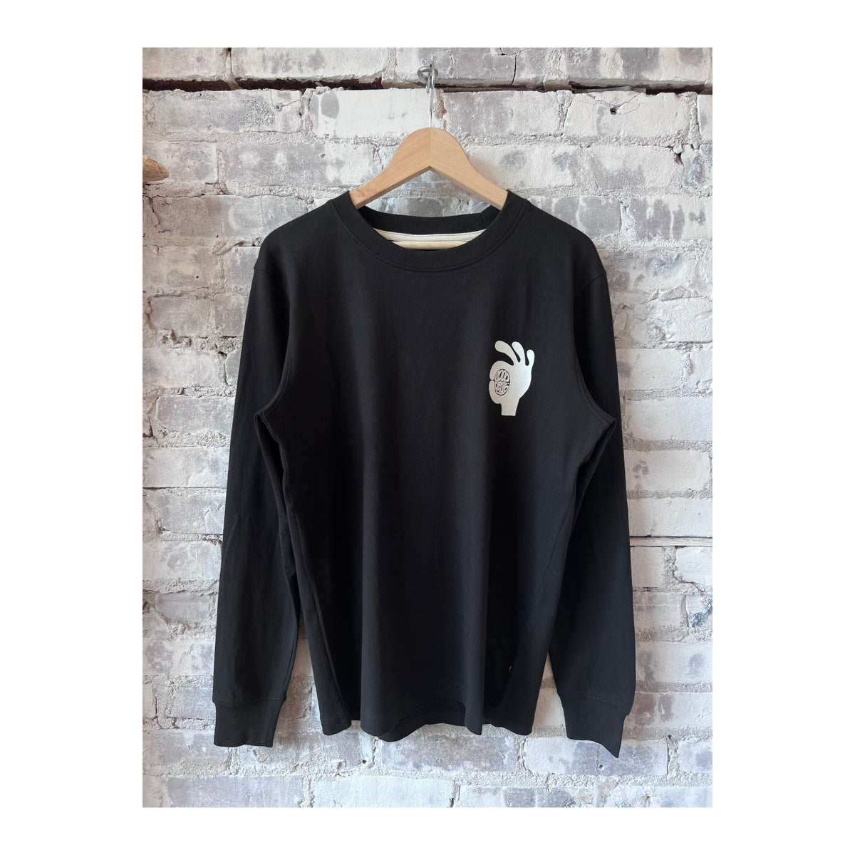 Men's black T-shirt by Far Afield featuring the "New Fatherhood OK" print in meteorite black fabric, casual and comfortable fit.