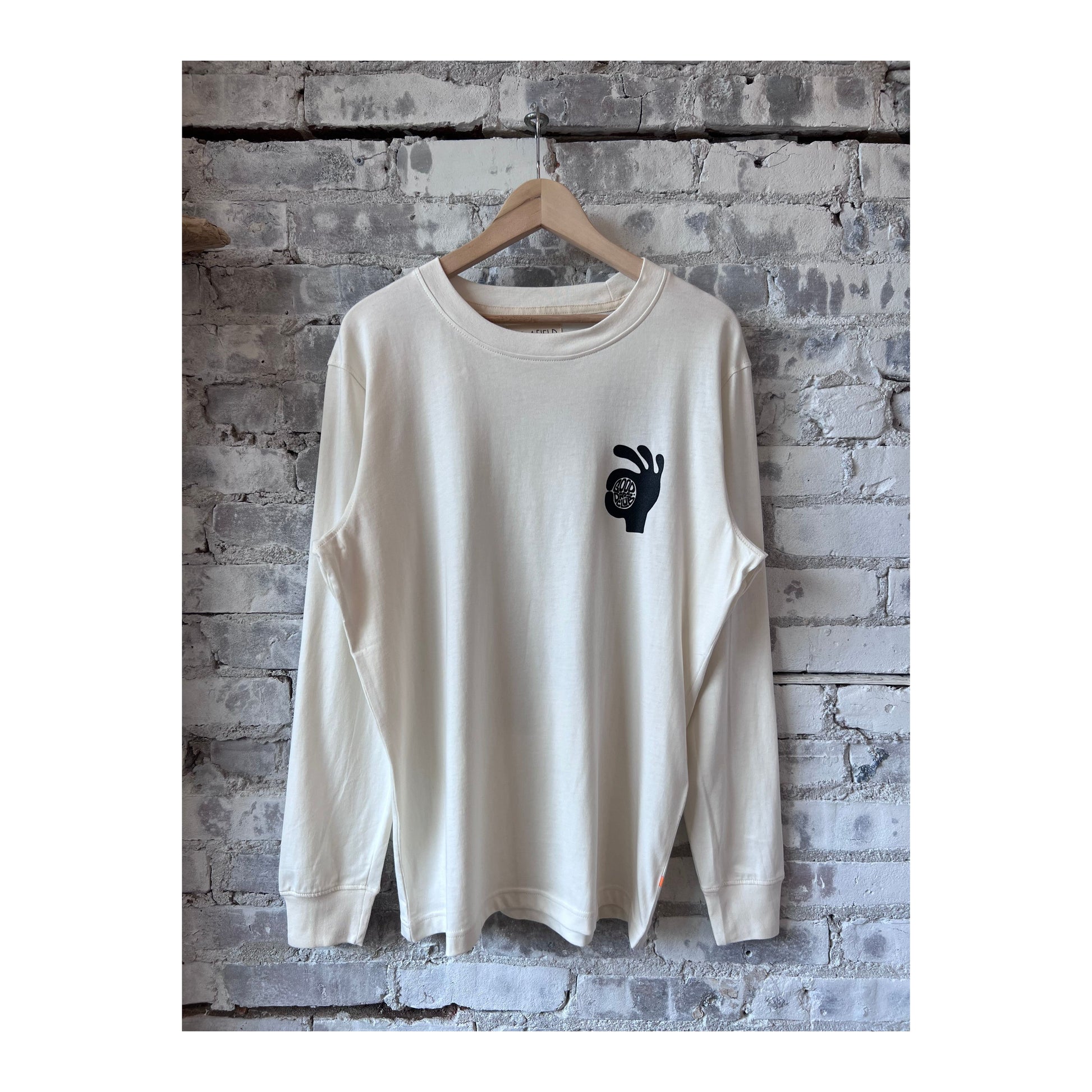White men's T-shirt by Far Afield featuring "The New Fatherhood OK" print, casual fit and soft cotton fabric.