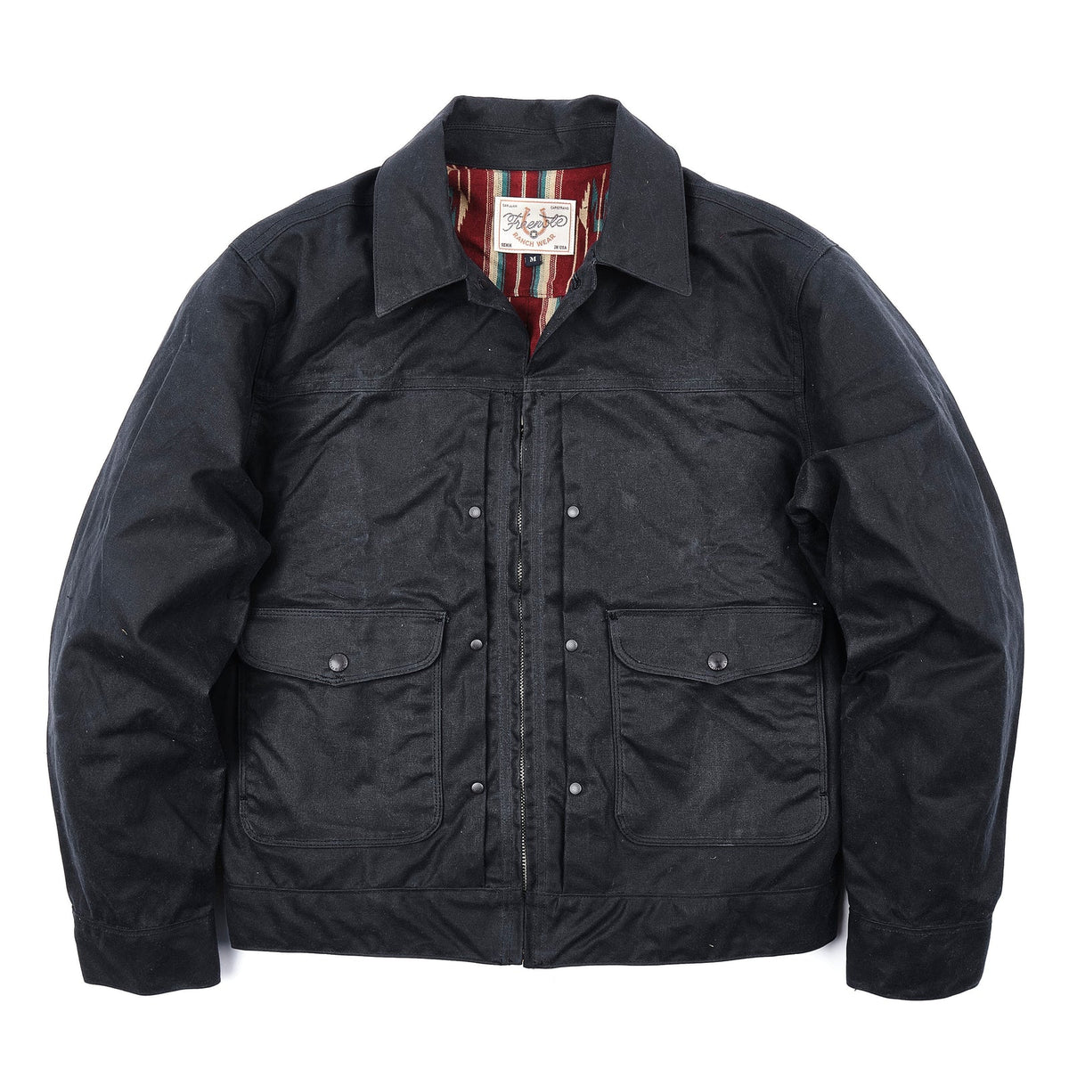 Men's Faro 10 Ounce Waxed Jacket in black by Freenote Cloth, showing the durable, stylish outdoor jacket with a rugged look.
