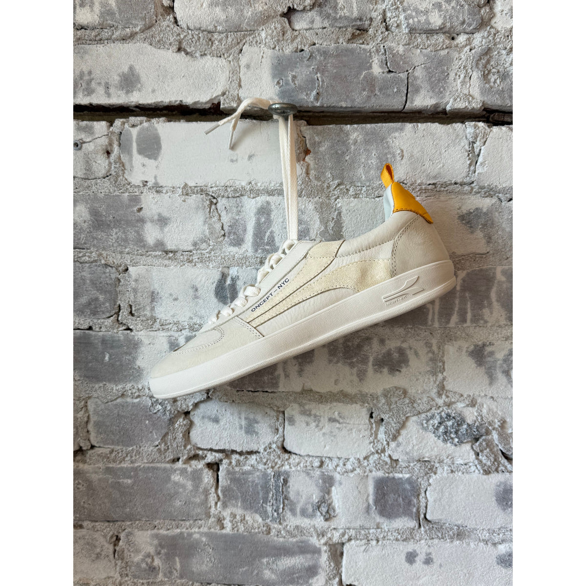 Oncept Fez men's sneaker in vintage white, showcasing a stylish casual shoe with a sleek design and comfortable fit.