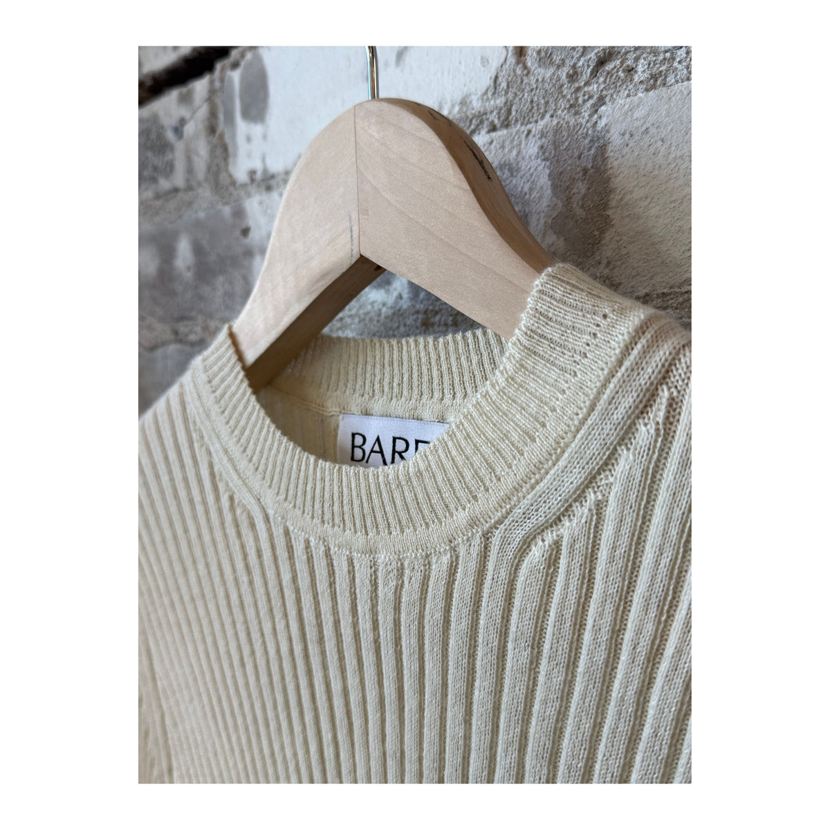 Women's Bare Knitwear Fine Knit Rib Top in pearl color, close-up view of soft, ribbed knit fabric and stylish fit.