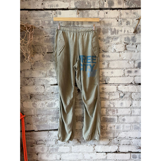 Women's Freecity Airjump Pant in Silver Rock Blues with matte satin finish, featuring flap and snap details.