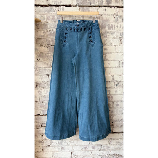 Women's flared sailor pants in medium wash denim by Hope For Flowers, featuring a high waist and relaxed fit with wide legs.