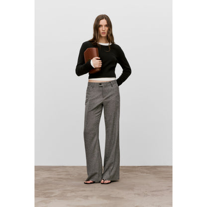Women's Flye Flared Flannel Pants in multiple colors by Closed, showing the relaxed fit and vibrant pattern on soft fabric.