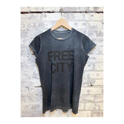 Women's Freecity vintage short-sleeve tee with "the doing of it is the being of it" print in volcano powder color.