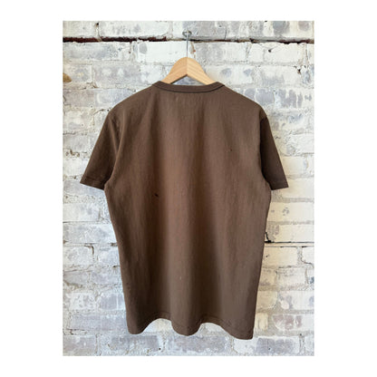 Men's 13 oz chocolate pocket T-shirt by Freenote Cloth, showing the front view with a chest pocket and casual fit.