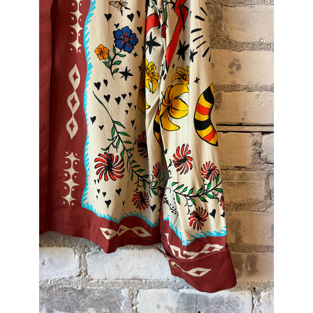 Women's French cuff shirt from Hope For Flowers paired with a Curio Scarf, showcasing elegant cuff details and soft fabric.