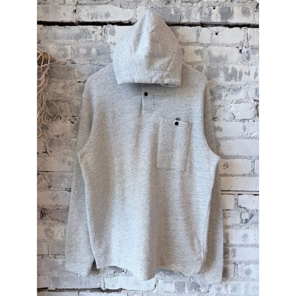 Men's Frenchloom Hoodie in Bone Heather by Relwen, showing the soft, textured fabric and classic hooded design.