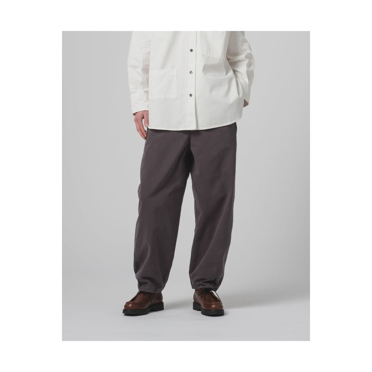 Women's G.O.D Pasha Satin Gabardine Pant in Asphalt, showcasing the sleek fit and smooth satin fabric.