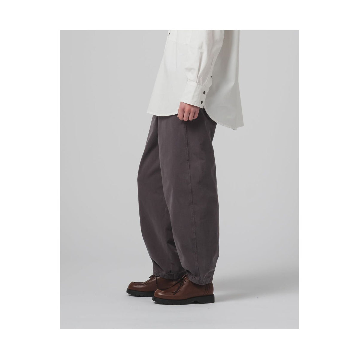 Women's G.O.D Pasha Satin Gabardine Pant in Asphalt, showcasing the sleek, tailored design and smooth satin fabric.