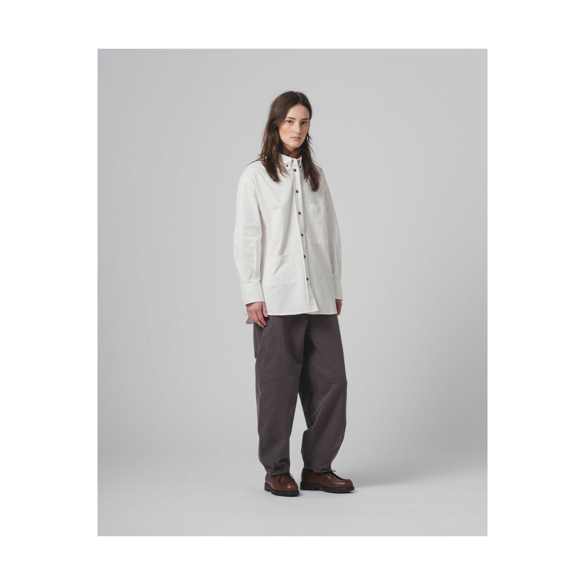 Women's G.O.D Pasha Satin Gabardine Pant in Asphalt, showcasing the stylish tapered design and smooth satin fabric.