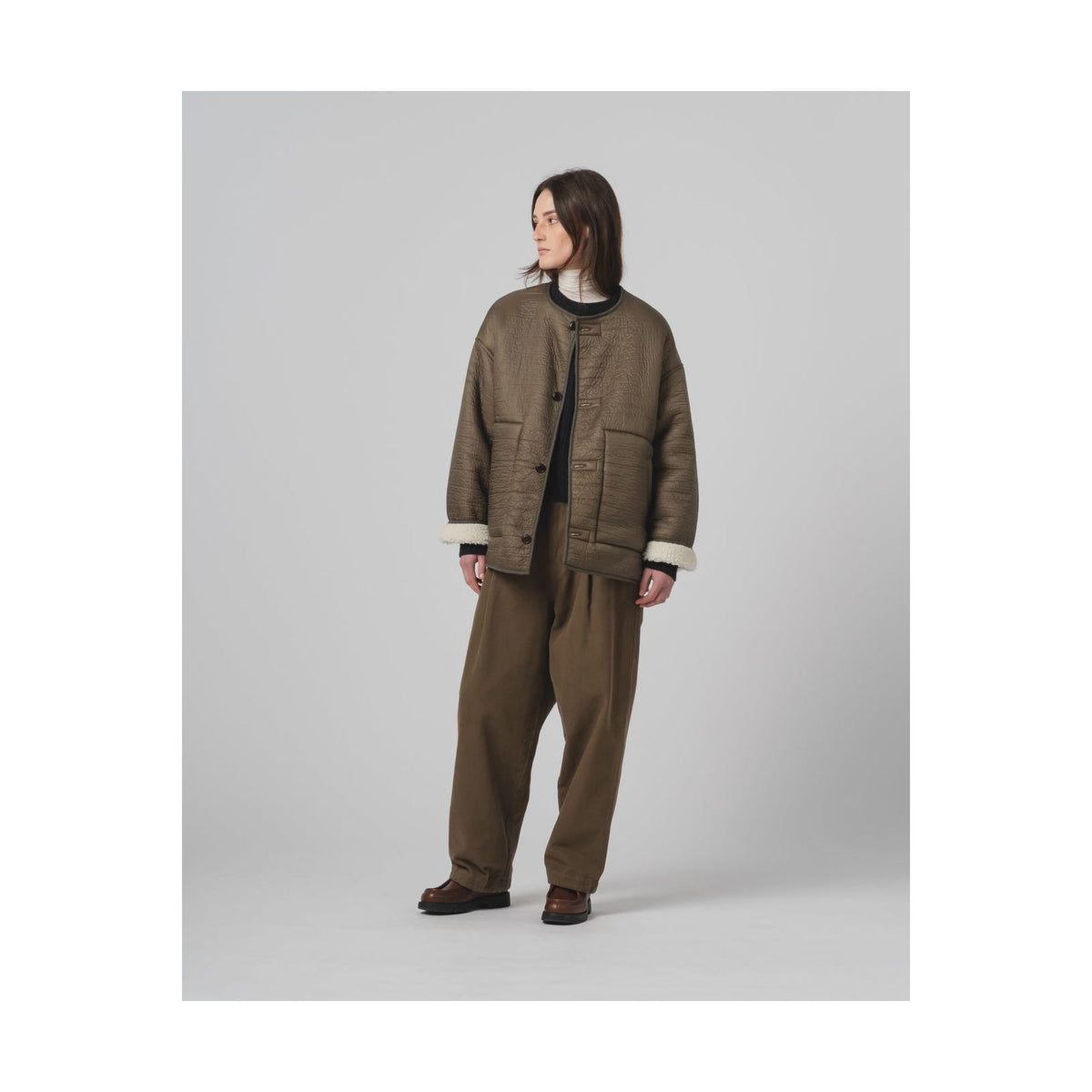 Girls of Dust G.O.D Solar Piumino nylon jacket for women in fossil and off-white, shown on a hanger with a lightweight, padded design.
