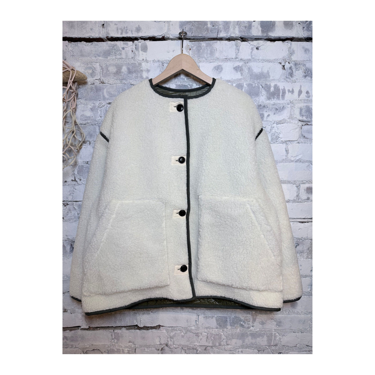 Girls of Dust G.O.D Solar Piumino nylon jacket for women in fossil and off-white, showing the lightweight, quilted design.