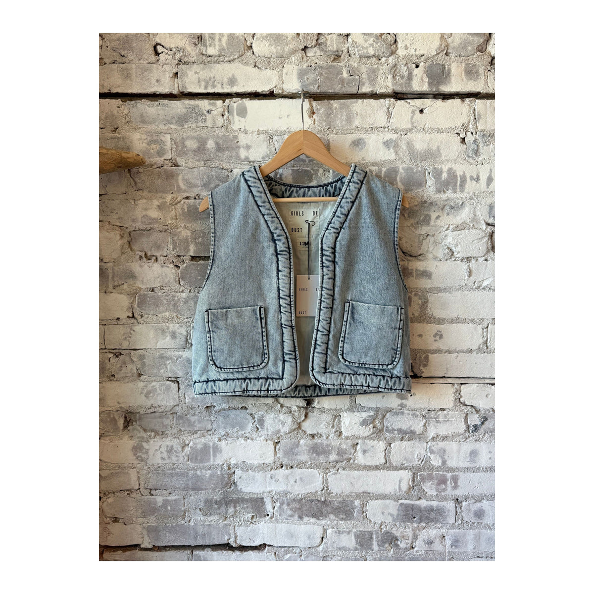 Girls of Dust G.O.D Tsuki Salt Lake Blue denim vest for women, front view showing classic denim styling and adjustable waist.