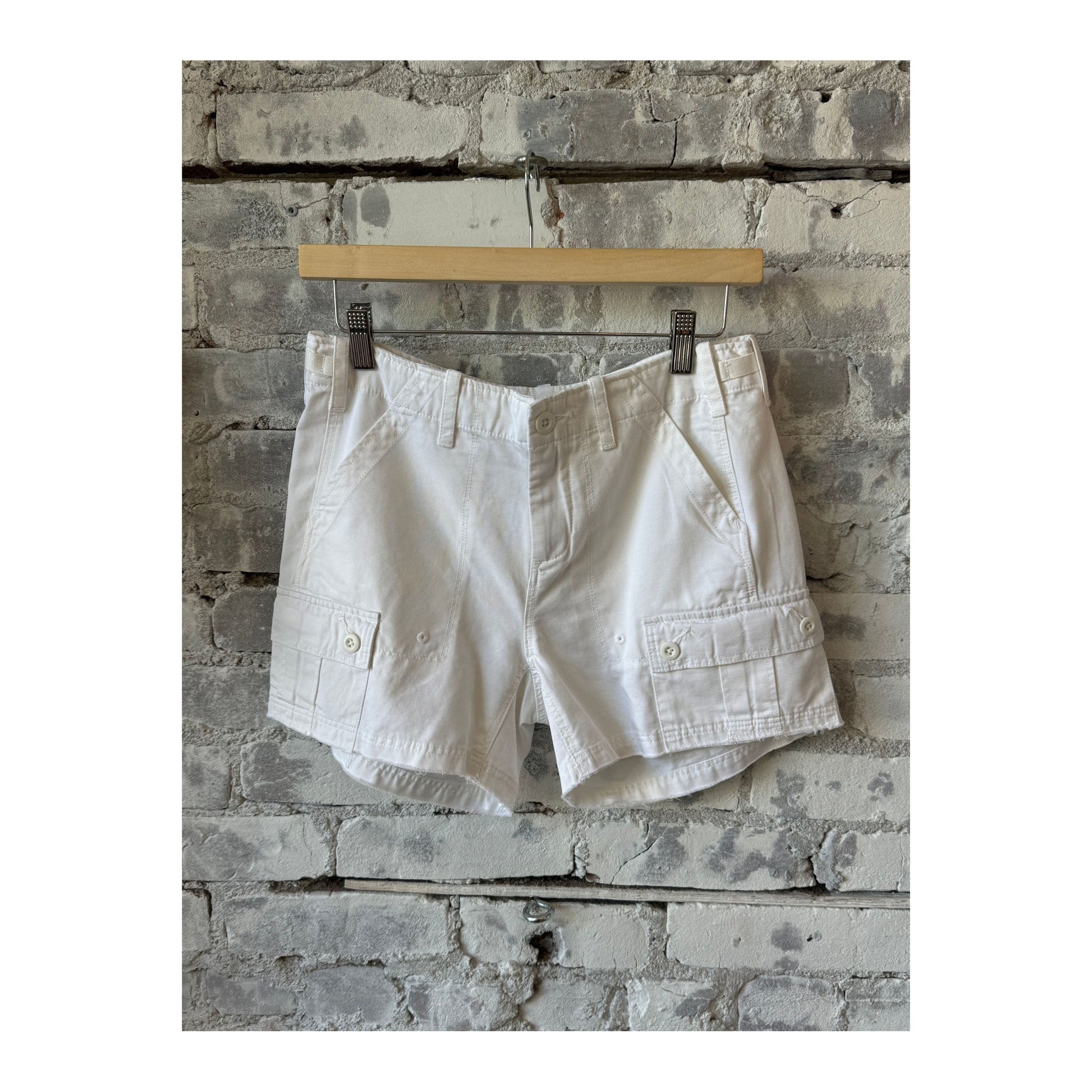 Women's white drill shorts by G1 Women's, showing a stylish casual fit with front pockets and a comfortable waistband.